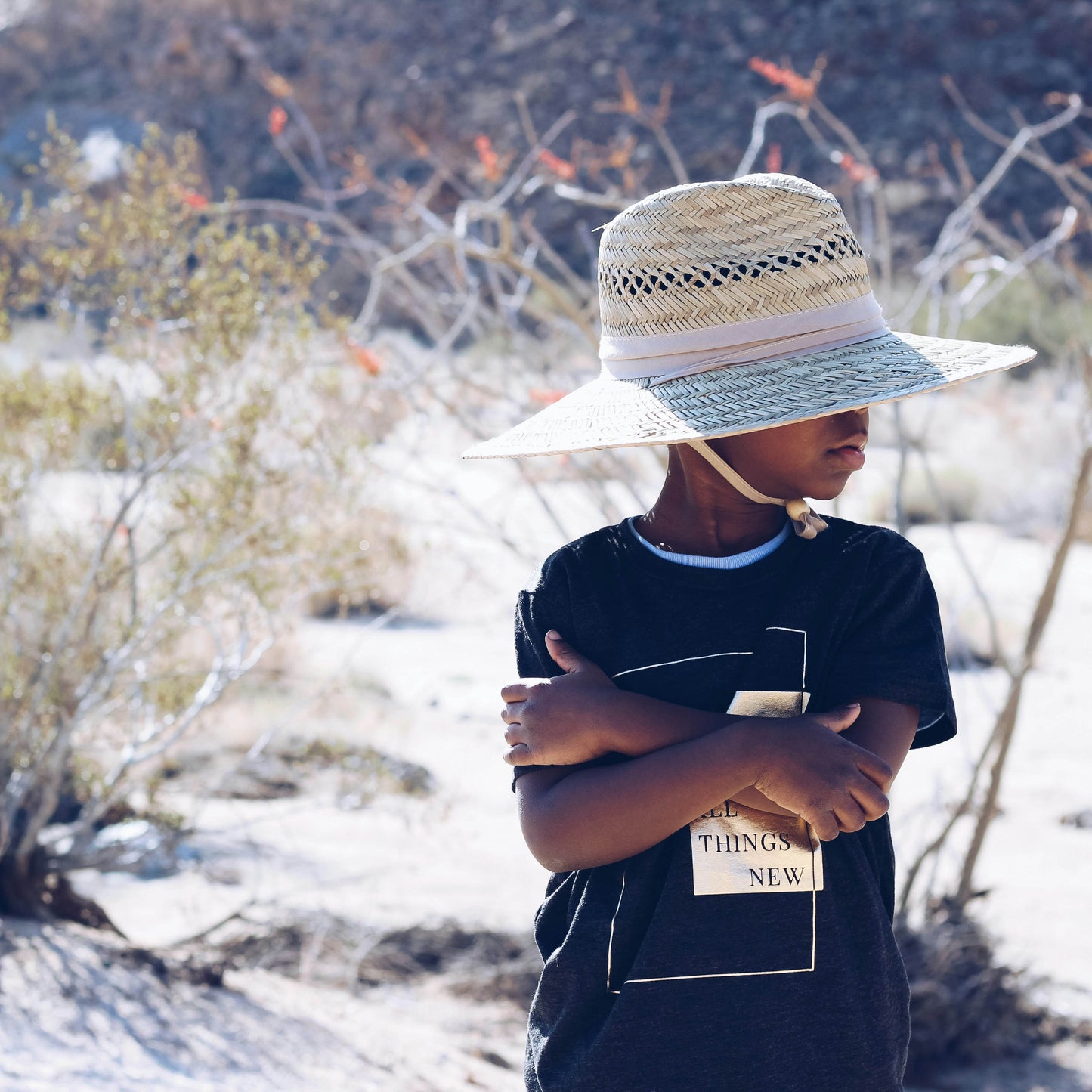 child wearing sun protection hat