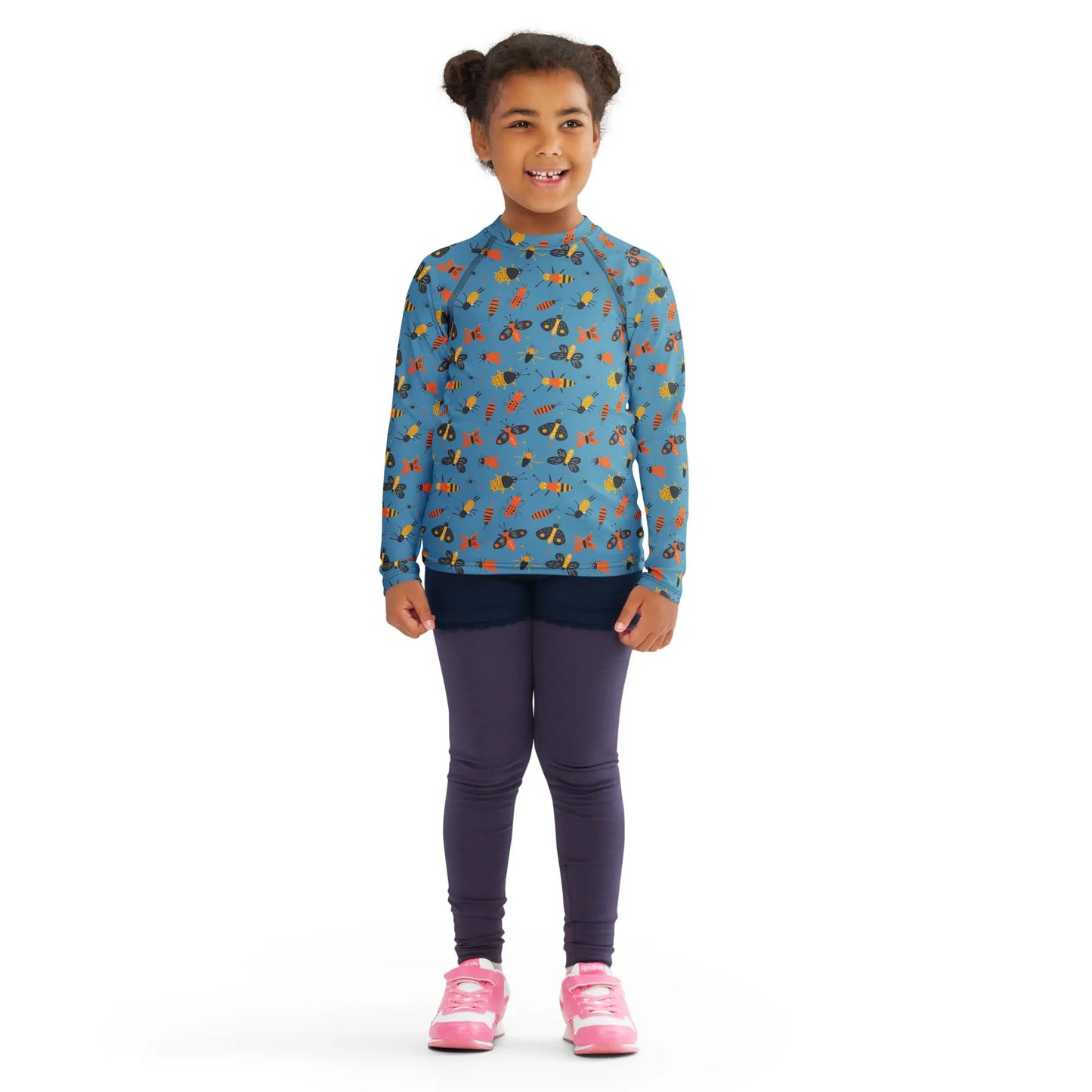 A kids’ rash guard featuring colorful bug prints, offering UPF 50+ protection and moisture-wicking properties for outdoor fun.