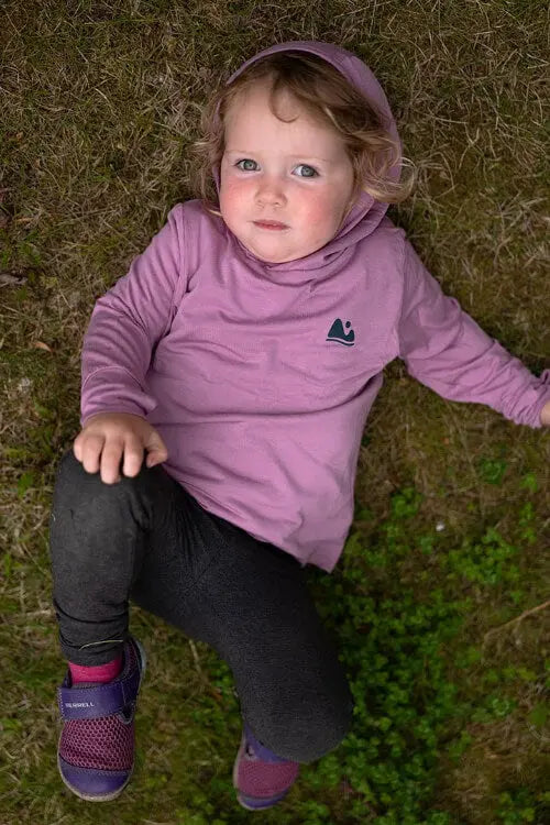 toddler girl wearing the one bamboo pink base layer and sun shirt