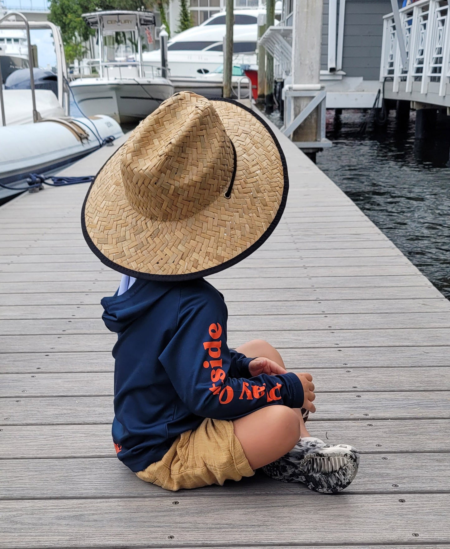 child fishing with Play Outside Hat