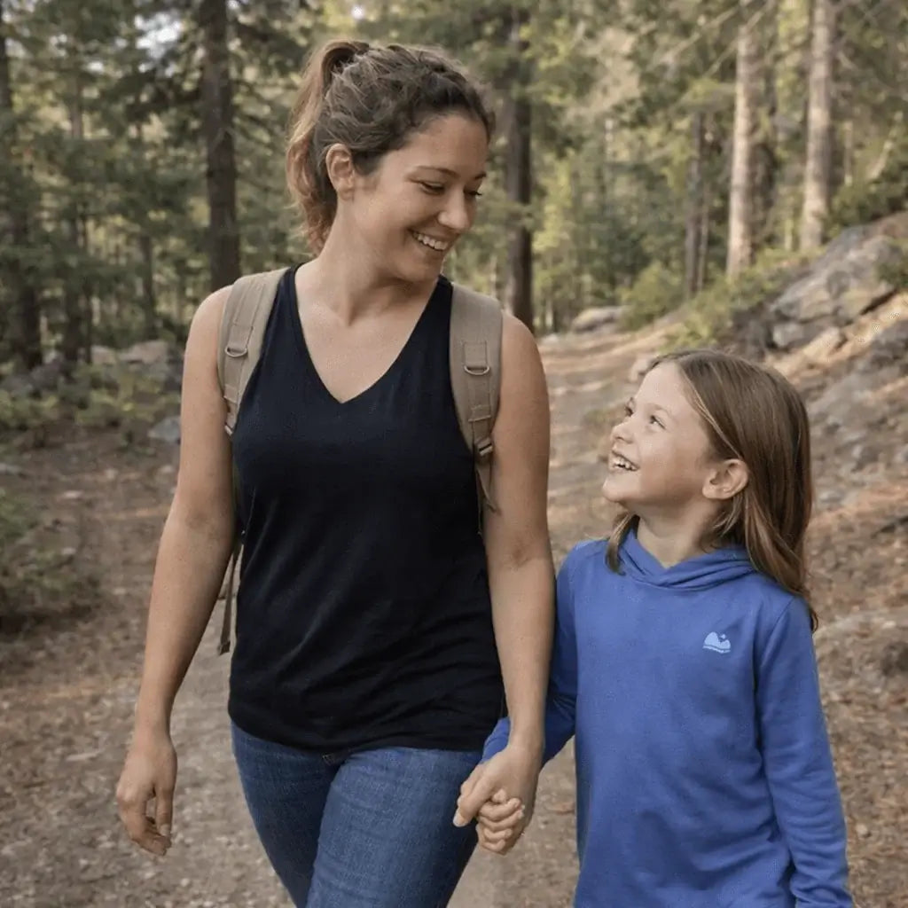 mom and daughter camping with natural fiber shirts