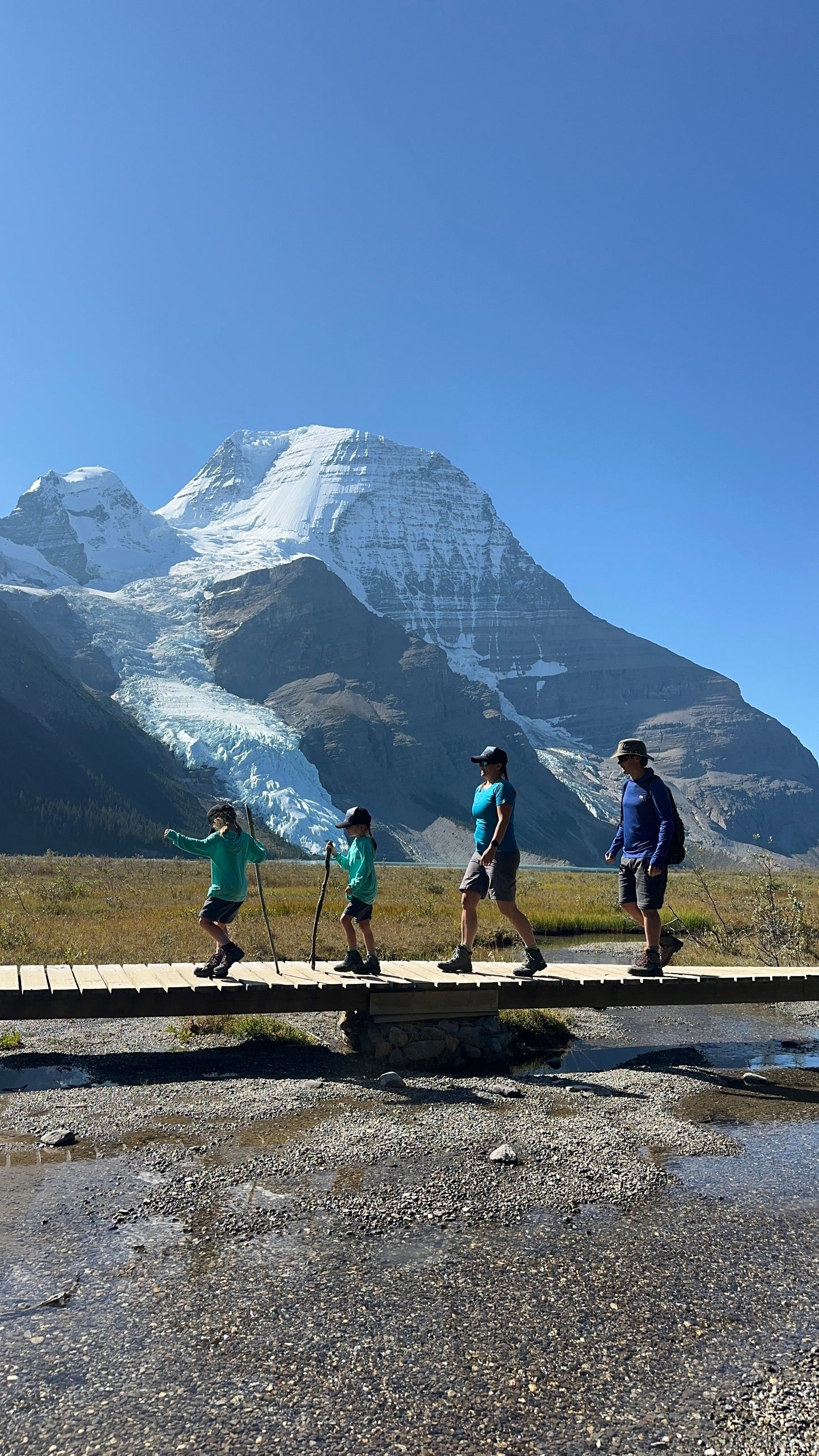 family hiking in stunning moutain