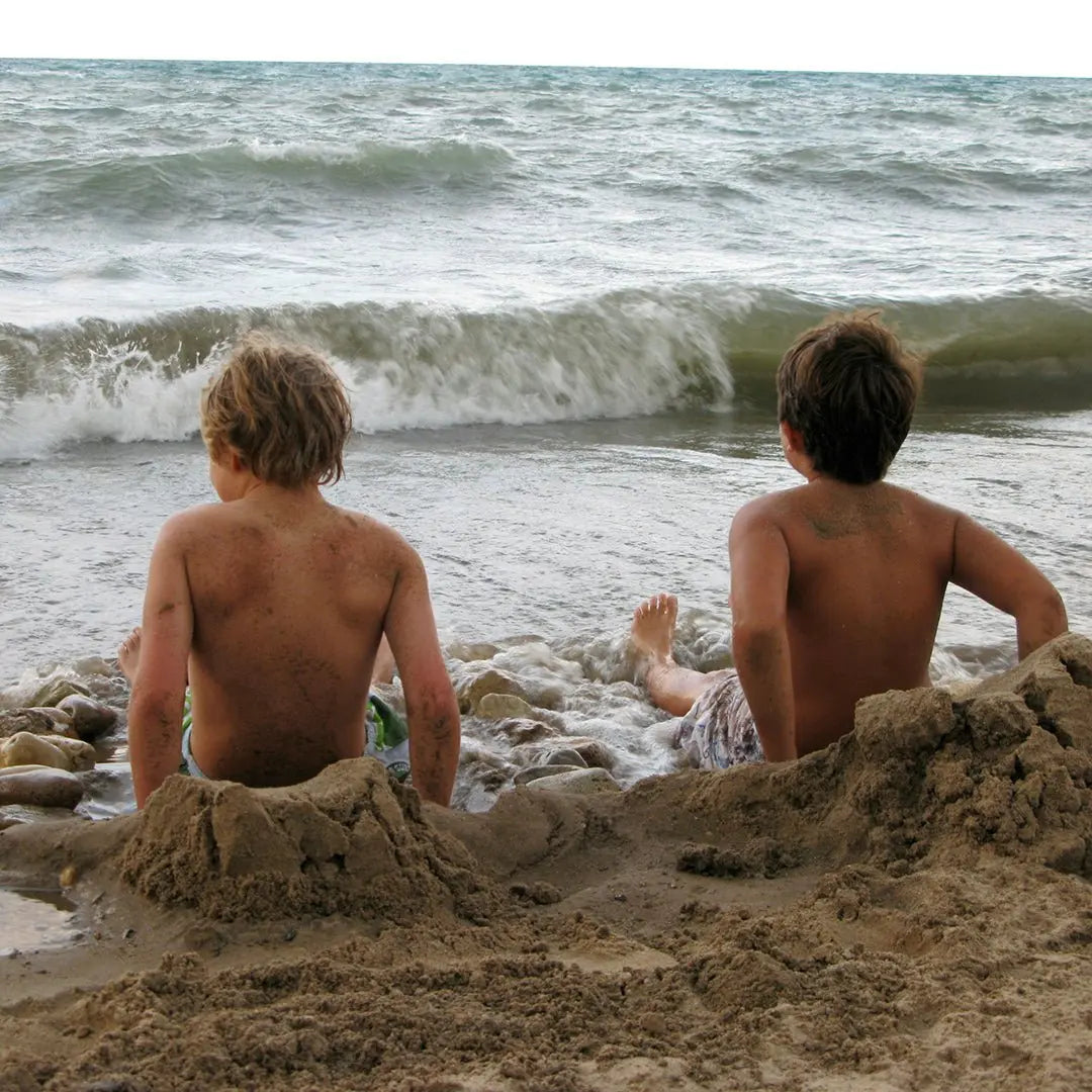 kids playing in the sand