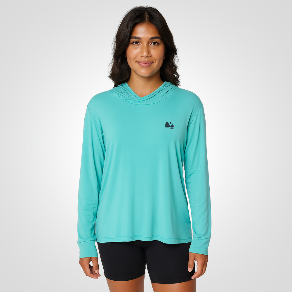 
                      
                        Woman wearing aqua bamboo sun shirt UPF ONE shirt and base layer
                      
                    