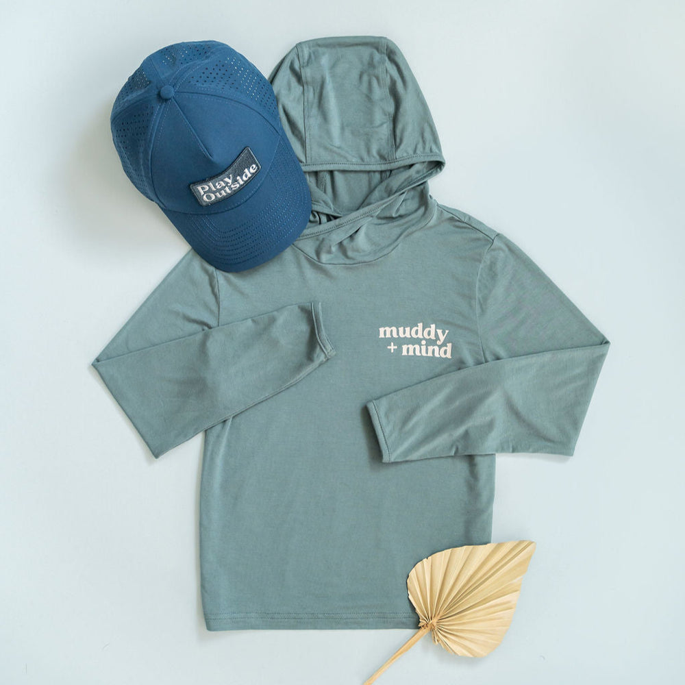 Teal bamboo sun shirt and base layer with blue hat