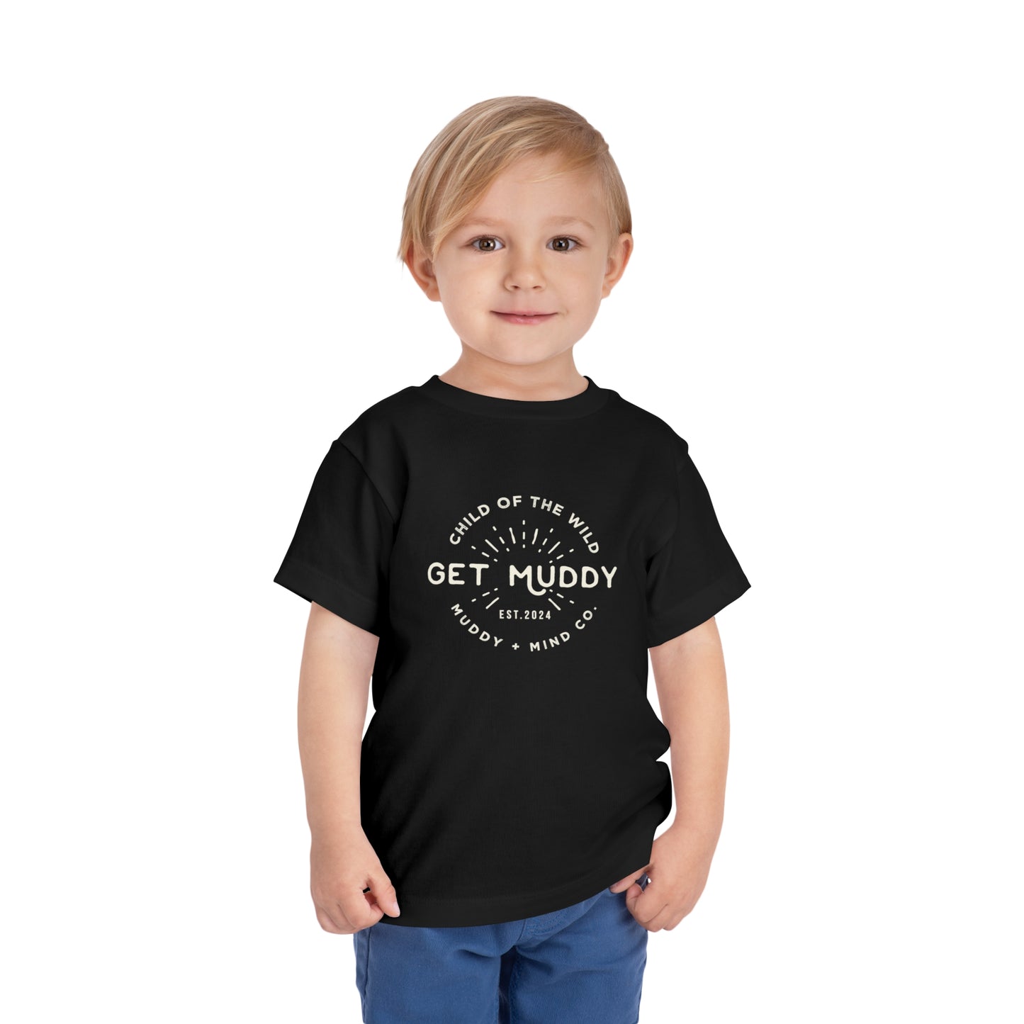 Child in Get Muddy tee, perfect for outdoor adventures.