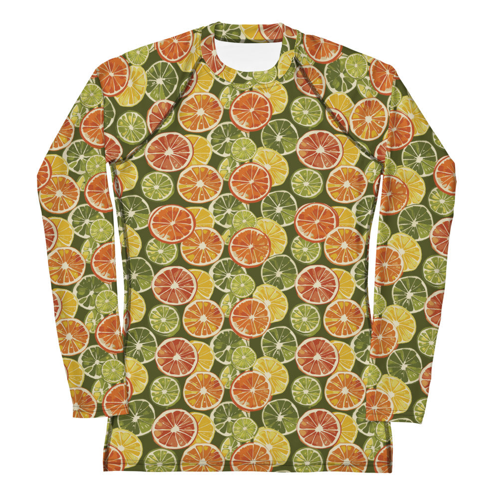 A vibrant citrus-themed rash guard for kids, featuring oranges and green leaves on a white background, shown from the front.