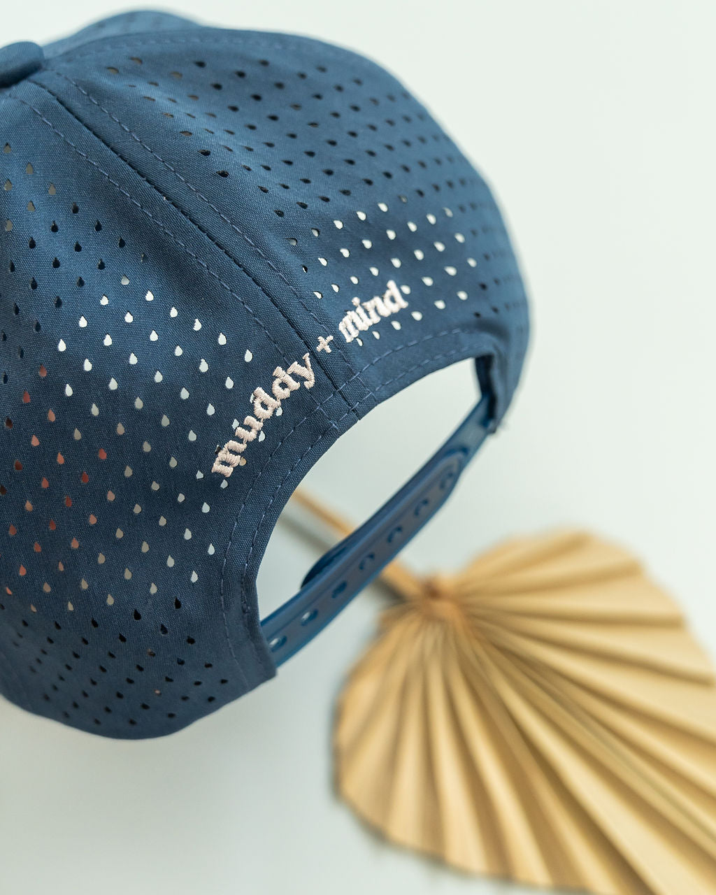 Back view of the Kids Snapback Hat, showing adjustable snapback closure for growing kids by Muddy + Mind.