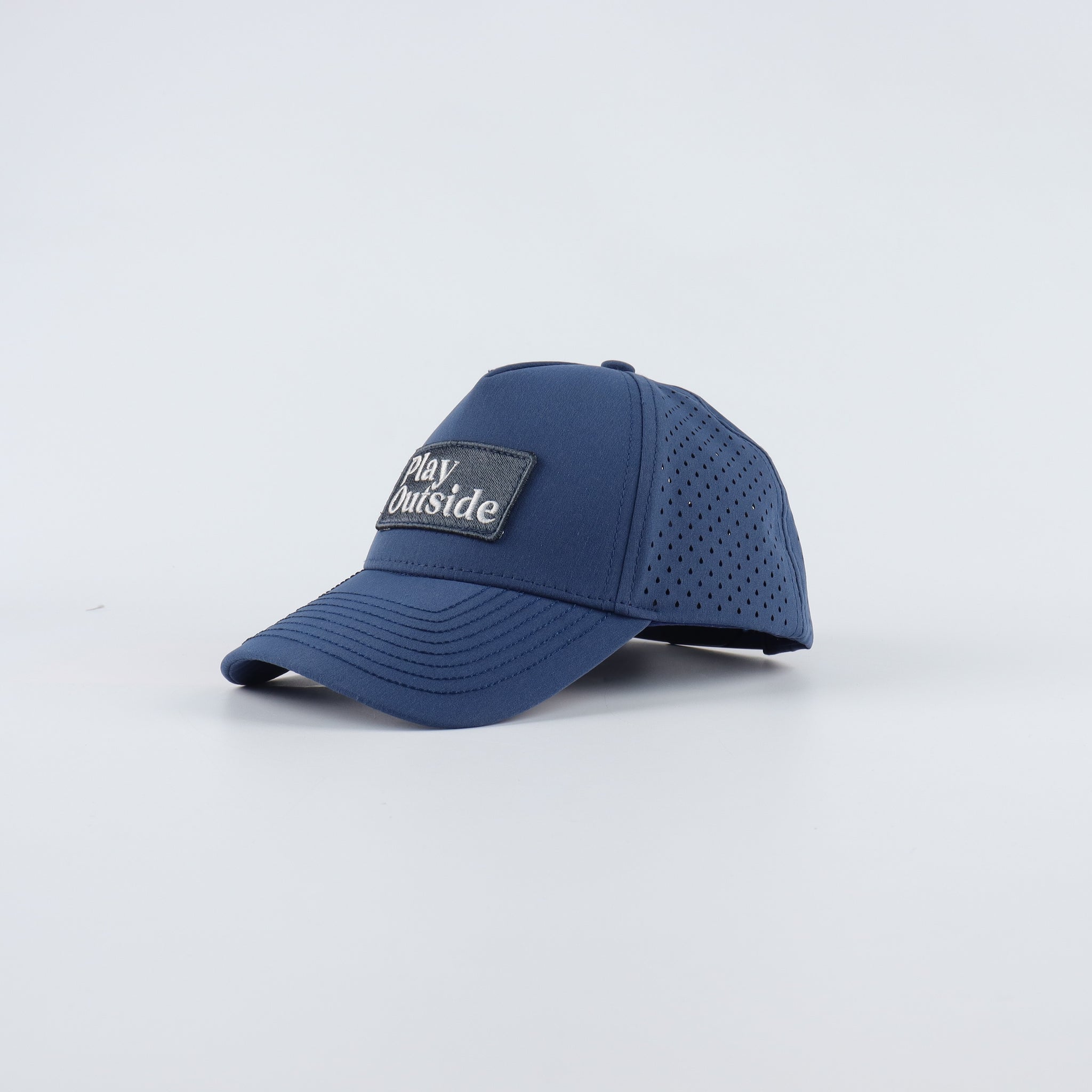 Side view of Muddy + Mind Kids Snapback Hat featuring a breathable design and durable fabric for outdoor adventures.