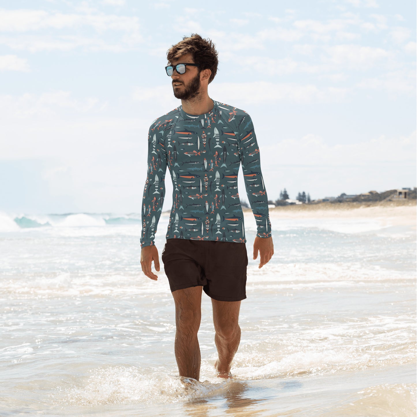 A men’s fish-themed rash guard with colorful aquatic designs, crafted for comfort and sun safety during water activities.