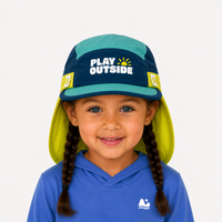 Child wearing a blue cap with 'Play Outside' text and a matching blue sun hoodie on a white background