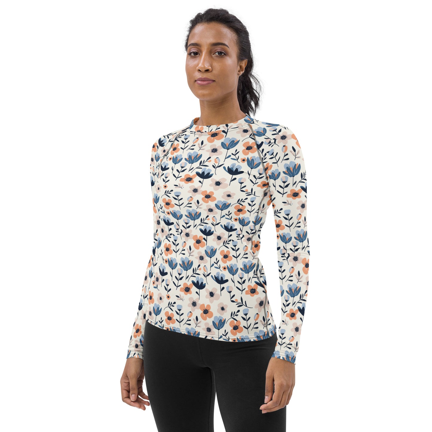 A stylish women’s rash guard featuring pastel flowers, perfect for staying cool and sun-safe during hikes or water sports.