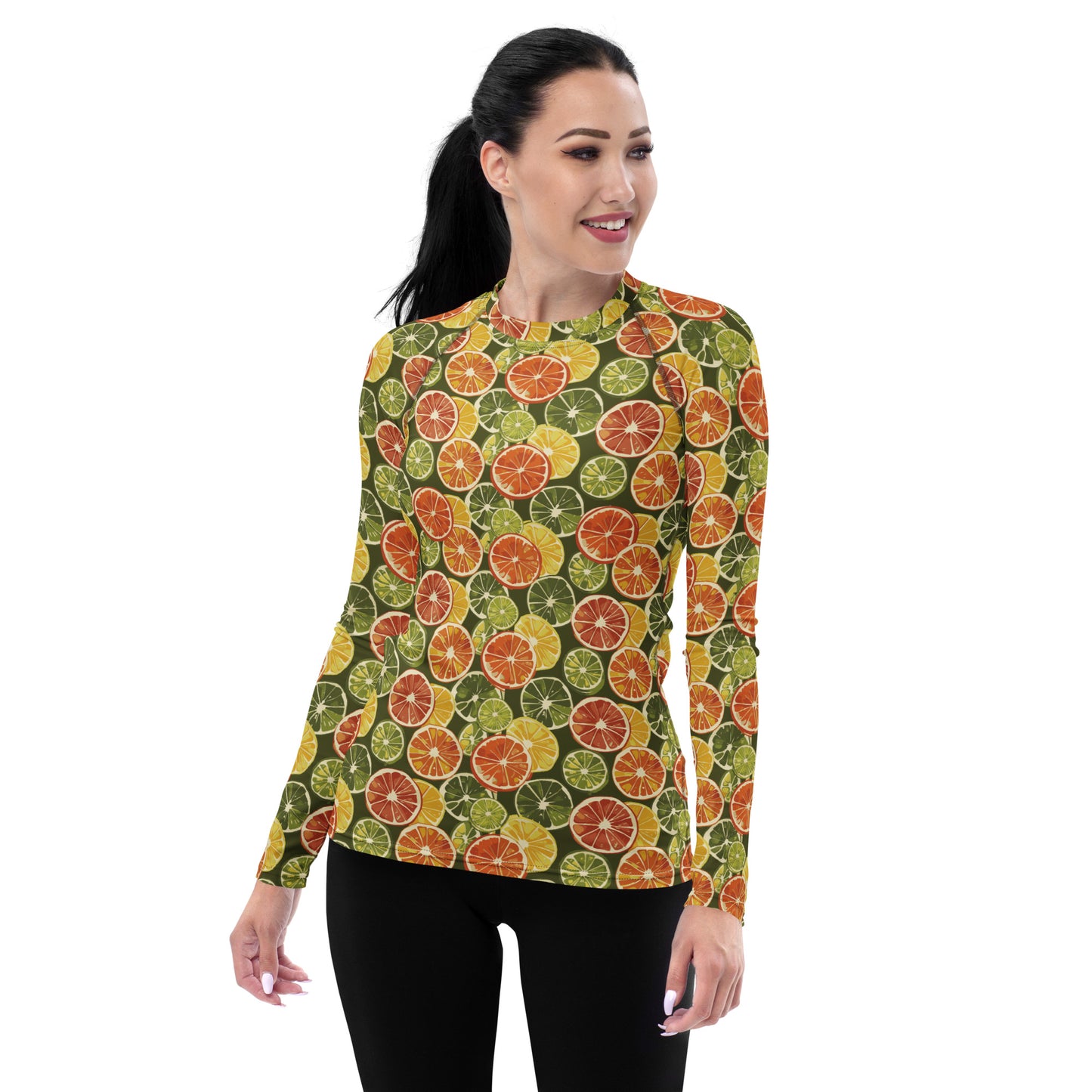 A women’s citrus-themed rash guard featuring colorful oranges and leafy details, perfect for outdoor adventures, shown from the front.