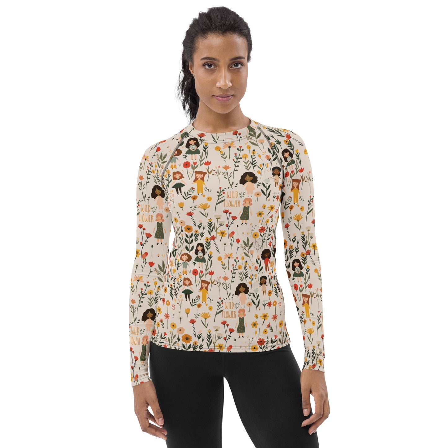 A women’s rash guard with soft floral tones, offering stylish sun protection and comfort for outdoor exploration.