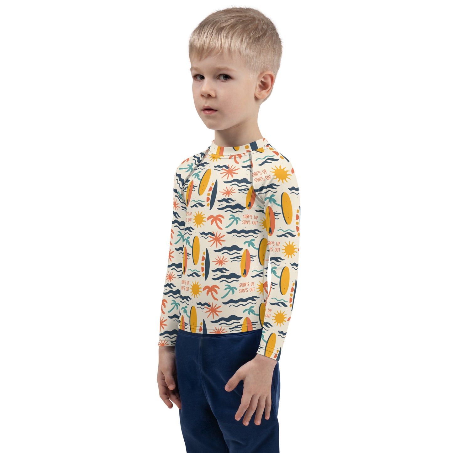 A surf-themed rash guard for youth with wave patterns, crafted for durability, sun protection, and outdoor fun.