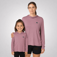 Mom and kid wearing the ONE bamboo sun shirt in pink